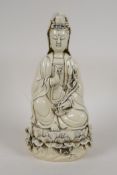 A Chinese blanc de chine porcelain figure of Quan Yin, impressed marks verso, 10½" high