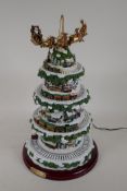 An automated Christmas centrepiece, The Thomas Kinkade Wonderland Express, 17" high