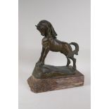 A cast bronze figure of a stallion, signed G. Mosarro?, 1963, 11½" long, 13½" high