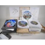 Twenty German and French porcelain collectors plates, mainly landscape scenes