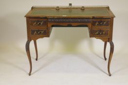 A Victorian mahogany desk of four drawers with moulded fronts and brass handles, the top with