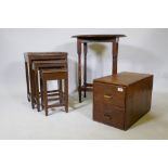 An early C20th oak two drawer filing cabinet, a 1930s oak occasional table, and a nest of three