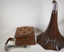 An antique horn gramaphone by The Gramaphone and Typewriter Company with angel trademark, part