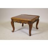 A C19th rosewood stool with carved decoration frieze, raised on cabriole supports, AF adapted with