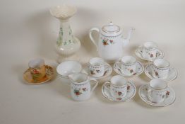 A Beleek porcelain vase, 8" high, a Heathcote china coffee service and a Japanese coffee cup and