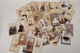 A quantity of Victorian portrait photographs, 7" x 4½"
