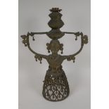 An Indian bronze figural lamp base, cast as a female figure supporting a lamp holder, 16" high