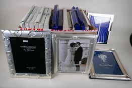 A box of sixteen silver plated photo frames, mixed designs, mostly 8" x 10"