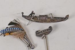 A silver filigree Neff, 2½" long, a silver and feather Cornucopia brooch and an 1891 pin