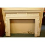 Architectural salvage, a large painted pine fire surround, with carved decoration, late C19th/early