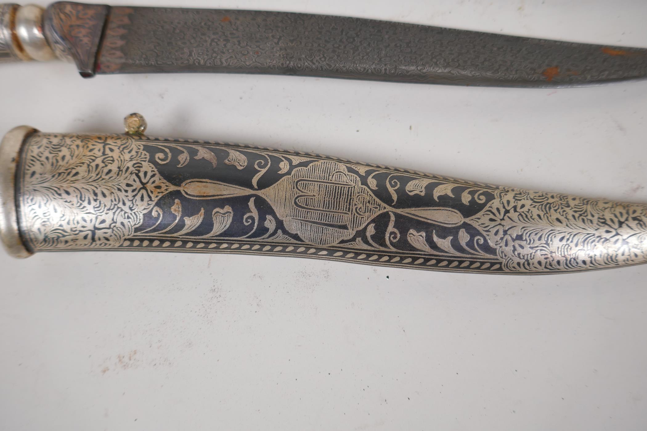 An Eastern dagger with rams mask handle and niello decorated scabbard, 15" long, and a horn - Image 4 of 5