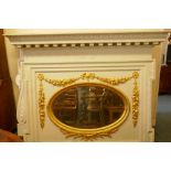 Architectural salvage, a large painted pine overmantel mirror with carved and gilded decoration, bea