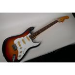A 1970s Japanese built Columbs Stratocaster guitar in Sunburst finish, 40" long, comes with soft gig