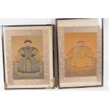 A pair of Chinese framed watercolour prints of emperors, with silk mounts, 11" x 14"