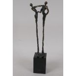 A modernist bronze figure of a couple dancing, signed, on a square base, 11" high