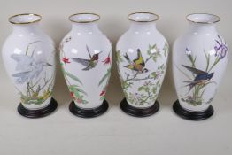 A set of four Franklin porcelain vases decorated with Basil Ede bird designs Meadowland, Farmland,