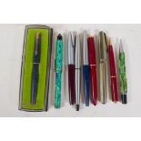 Six fountain pens, four Parker, one Shaeffer, a Watermans 513, etc, and two propelling pencils