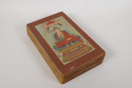 A Sino Tibetan printed concertina book depicting various thangkas, 11" x 6½"