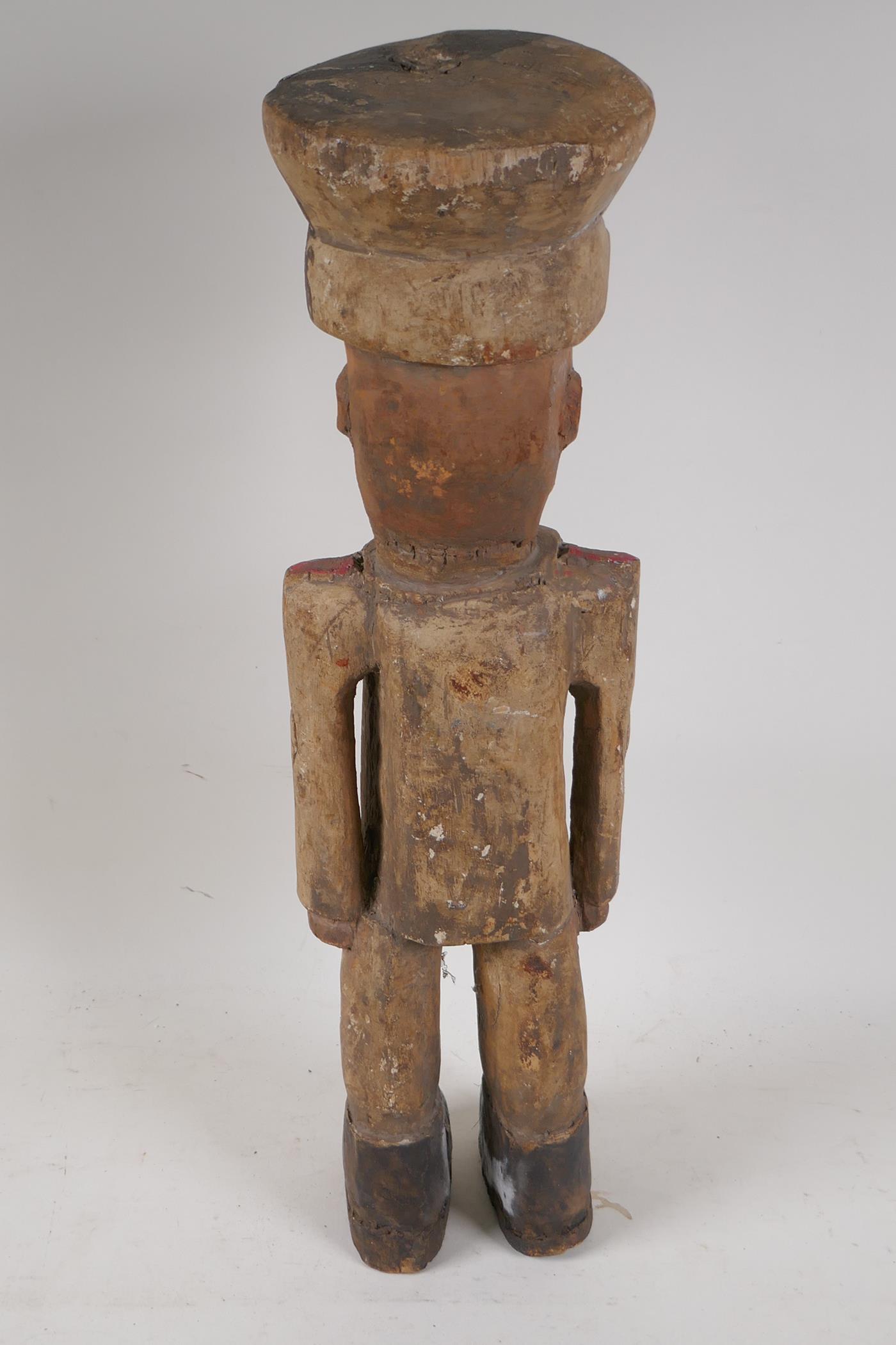 A carved wood figure of a soldier, 20" high - Image 3 of 3
