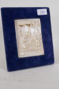 A carved ivory panel depicting the Nativity and the Adoration of the Shepherds, possibly