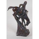 After Remmington, a bronze figure of a North American Native hunter on horseback, 9½" high