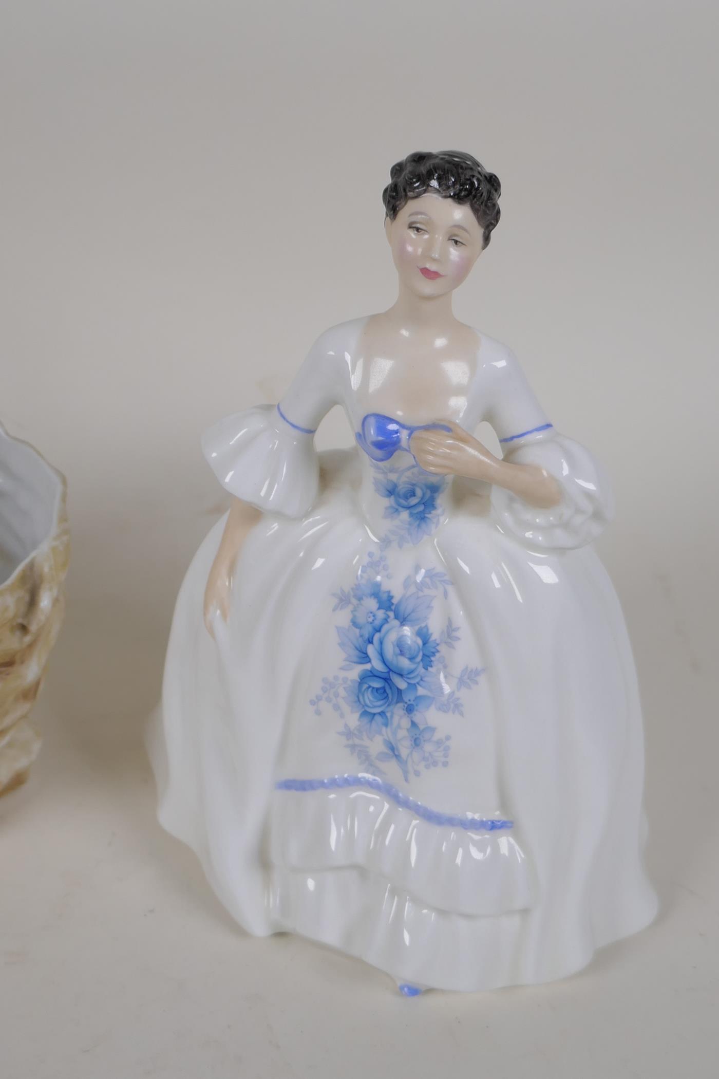 A Sitzendorf porcelain posey basket formed as a child seated on a shell, a Royal Doulton - Image 3 of 4