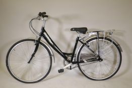 A Claude Butler 6061 Stepthrough bike with an aluminium frame, 27" wheels