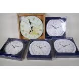 Five new and boxed Quartz kitchen wall clocks, largest 12" diameter