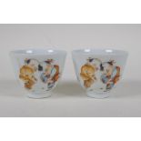 A pair of Chinese Republic period porcelain tea bowls decorated with boys playing marbles, 4