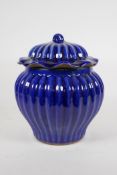 A blue glazed porcelain ginger jar and cover of ribbed form, Chinese Qianlong 4 character mark to
