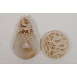 A Chinese carved and pierced white jade pendant with dragon decoration, and another in the form of a