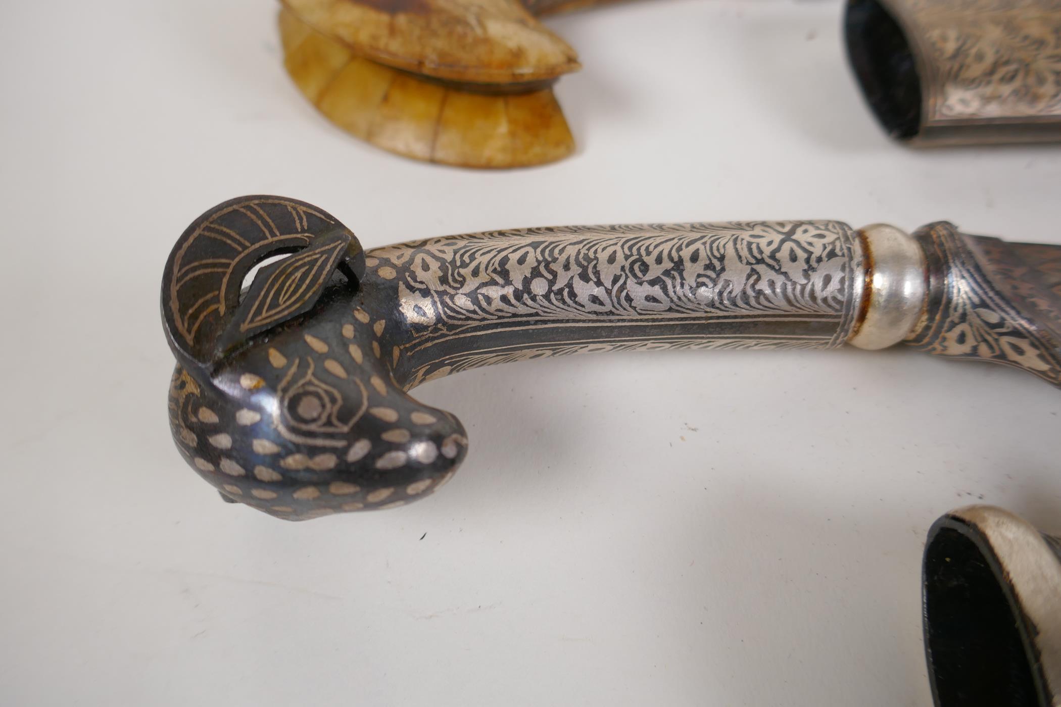 An Eastern dagger with rams mask handle and niello decorated scabbard, 15" long, and a horn - Image 3 of 5