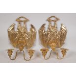 A pair of gothic style ormolu two branch wall sconces in the form of vampire bats, 9½" x 13½"