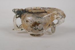 A Chinese moulded glass/crystal libation cup with a dragon shaped handle, 5" long