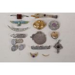 A collection of vintage costume jewellery including an Art Deco Egyptian Revival silver and enamel