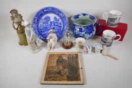 A quantity of pottery and porcelain including Minton tile, Copeland and Buckingham Palace mugs,