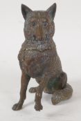 A bronze inkwell in the form of a seated wolf, lacks liner, 6½" high