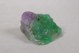 A Chinese bi-colour jade carving of a three legged toad, 2½" x 2½"