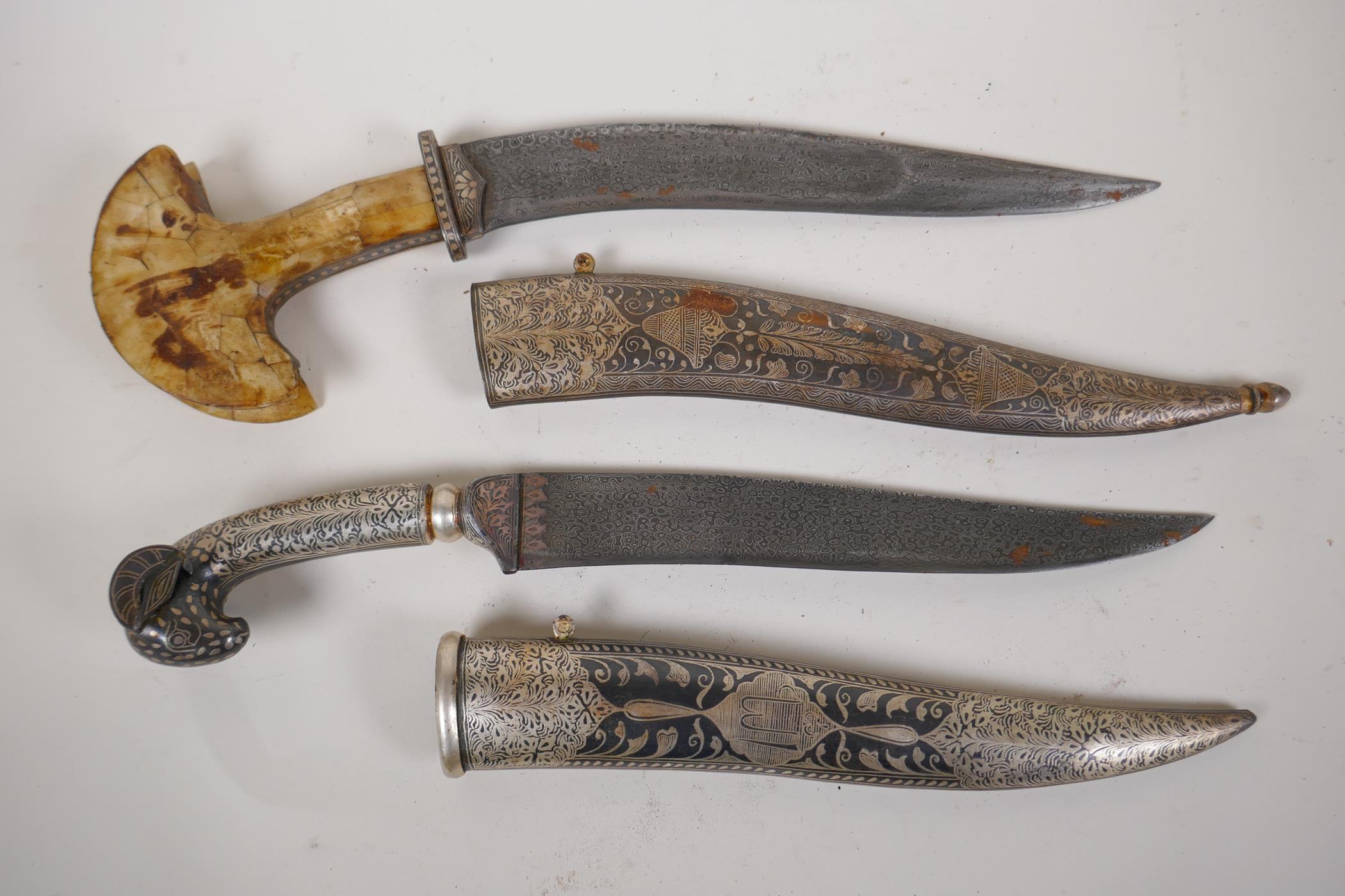 An Eastern dagger with rams mask handle and niello decorated scabbard, 15" long, and a horn - Image 2 of 5