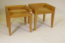 A pair of contemporary elm side tables with galleried tops, raised on tapering supports, 20" x 18" x