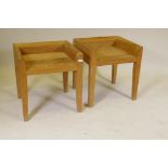 A pair of contemporary elm side tables with galleried tops, raised on tapering supports, 20" x 18" x