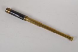 A small antique brass three draw telescope, 14" opened