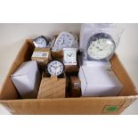 Fifty new and boxed alarm and travel clocks