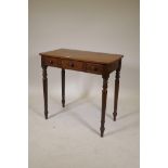 A C19th mahogany side table with three false drawers, raised on turned supports, 31" x 17" x 30"