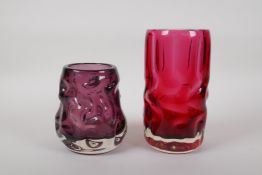 An amethyst studio glass vase and a similar cranberry studio glass vase, largest 7½" high