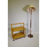 A 1970s teak and copper standard lamp, and a Haxyes beech folding hostess trolley, lamp 59" high