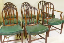 A set of eight (6+2) Hepplewhite style mahogany chairs, with hoop backs and well carved harebell and