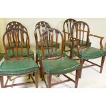 A set of eight (6+2) Hepplewhite style mahogany chairs, with hoop backs and well carved harebell and