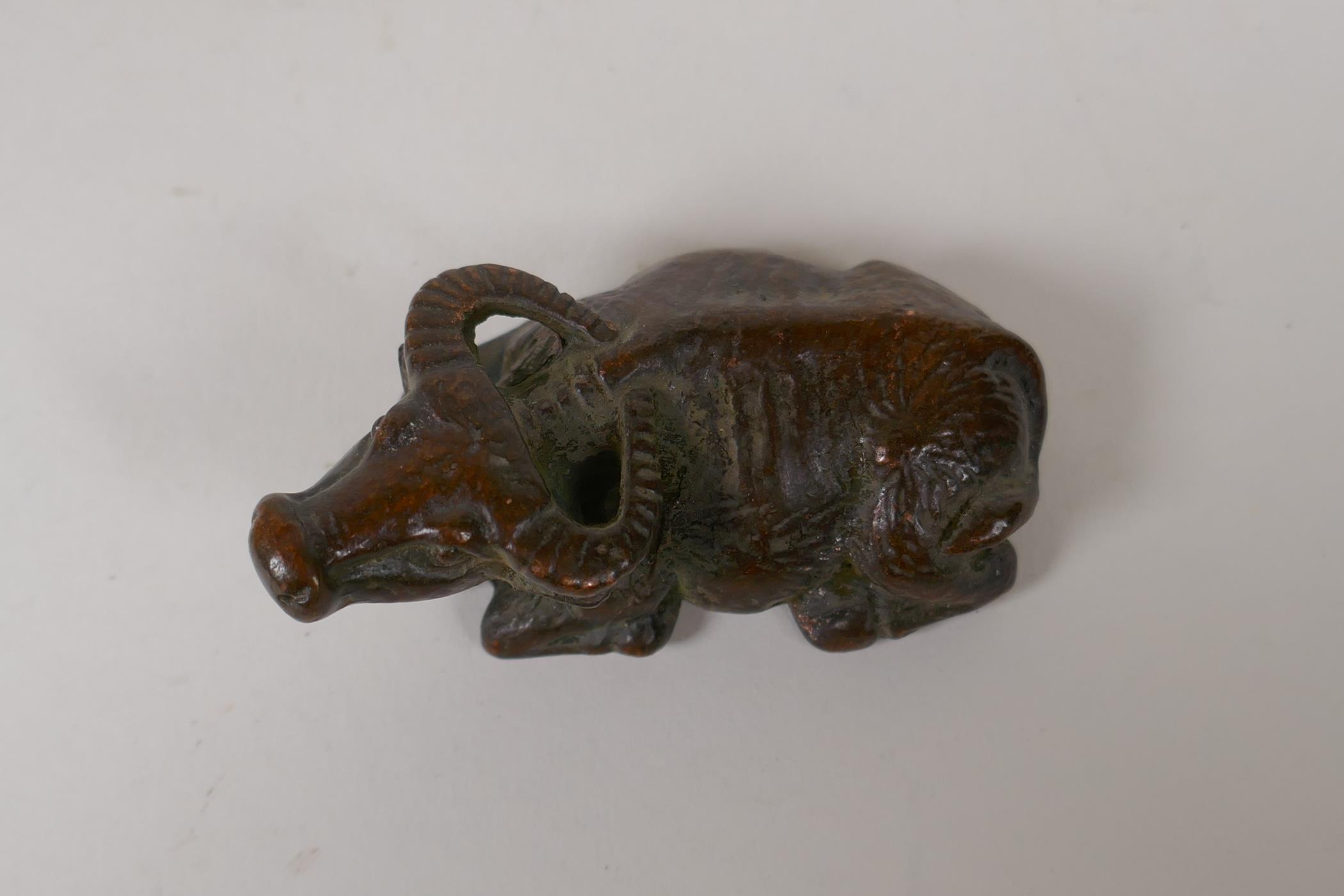 A Japanese style bronze okimono water buffalo, 2½" long - Image 2 of 3