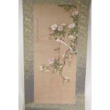 A Chinese printed watercolour scroll depicting asiatic birds amongst flowers, 12" x 27"